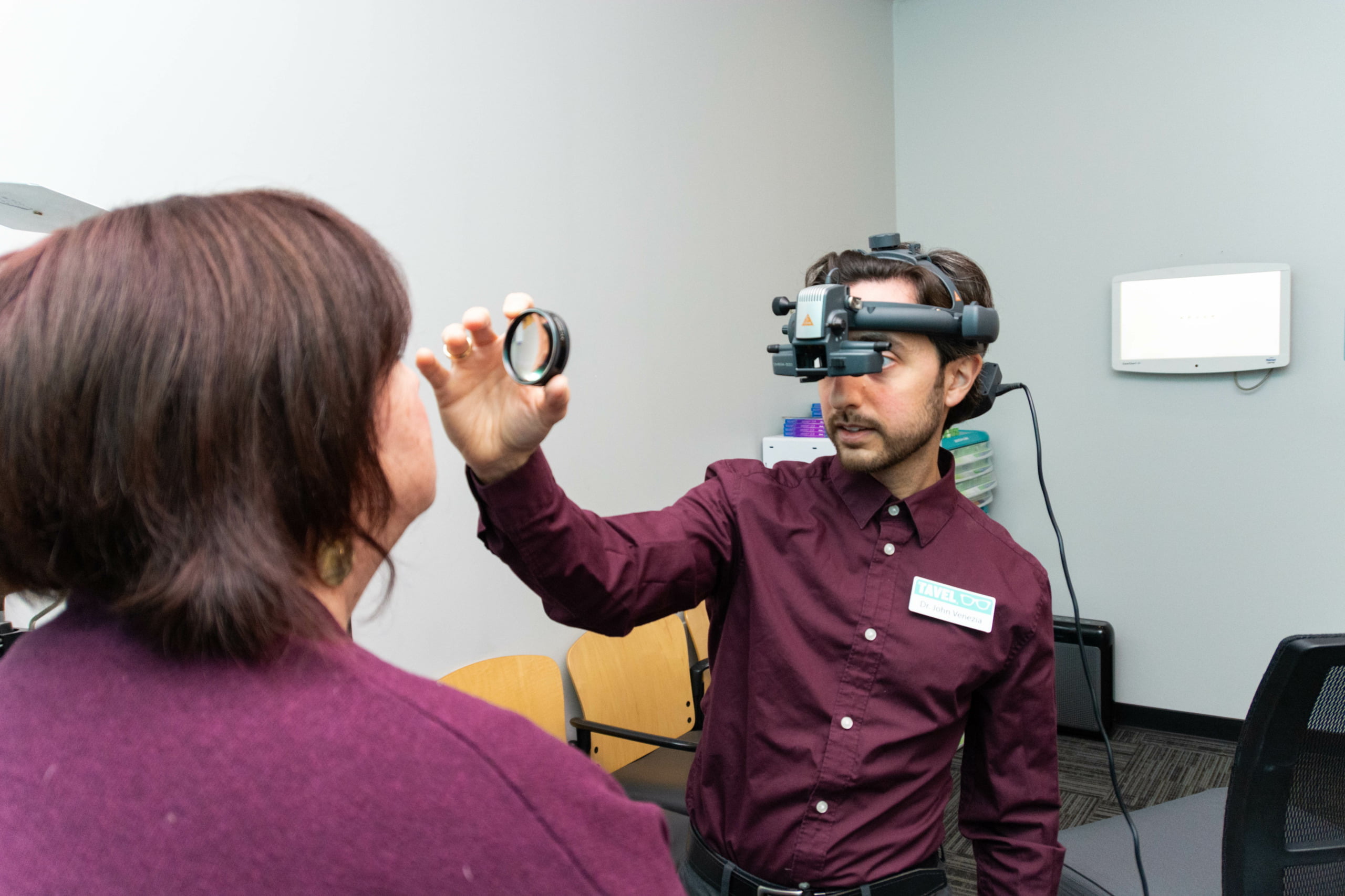 eye doctor testing low vision during eye exam